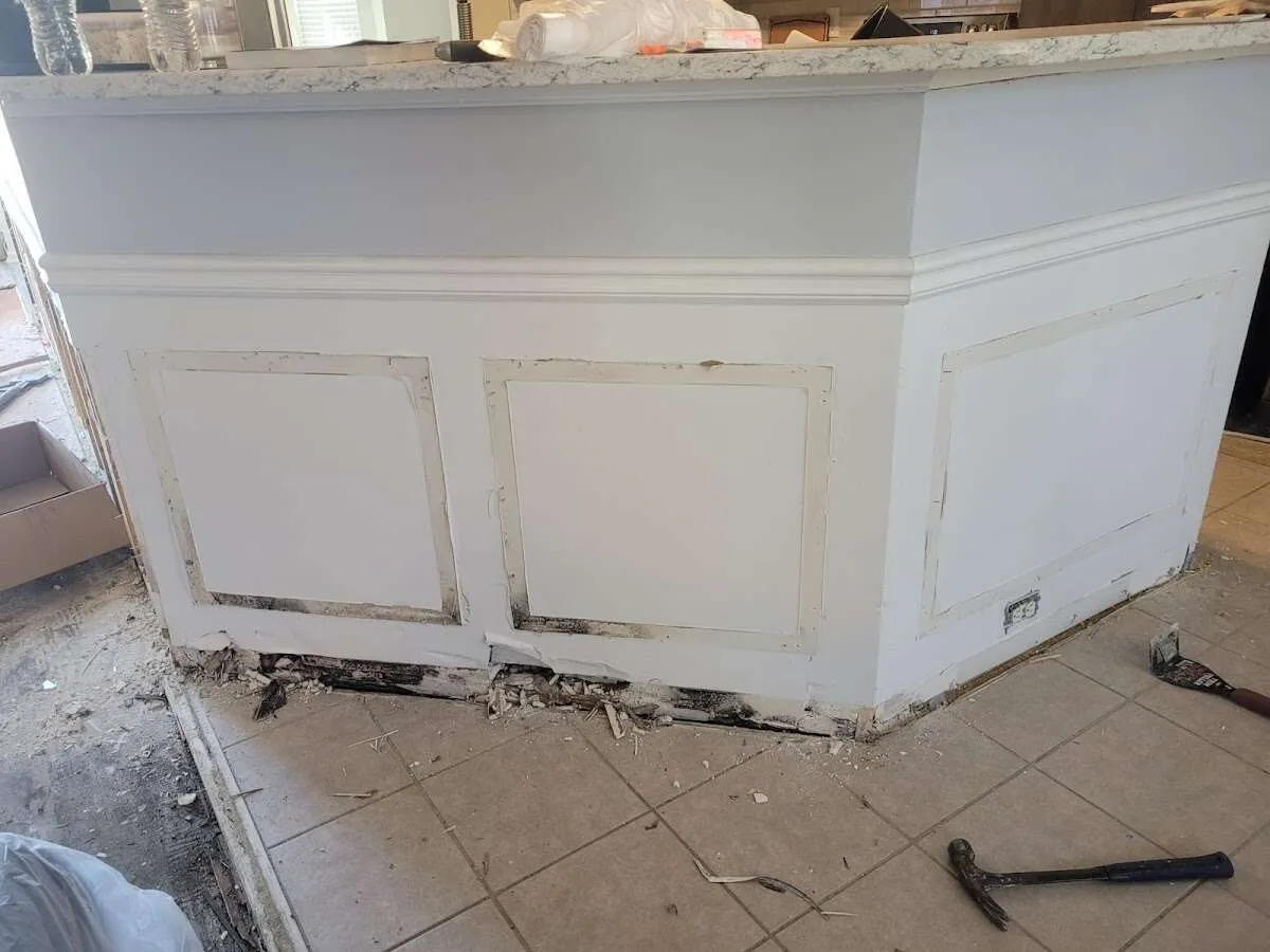 Water damage and mold on kitchen during Storm Damage Restoration in Titusville